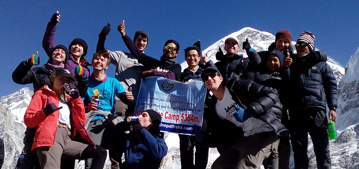 Trekkers celebrating at base camp of Everest